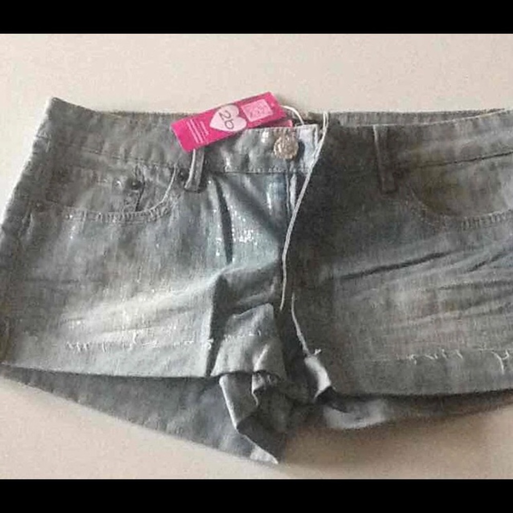 Glittery skinny denim shorts